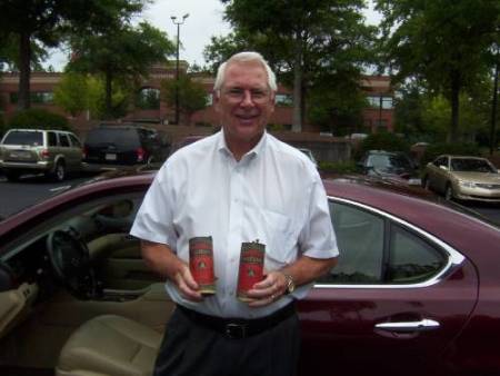 MIchael Dailey M.D. holds two Eveready "A" batteries of the four "A" batteries needed to power the Radiola 25  heterodyne radio receiver.