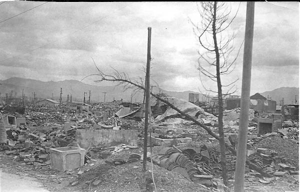 Nagasaki, after the Bomb. The USS Edison, DD-439, on immediate postwar duty trips, puts in at Nagasaki.